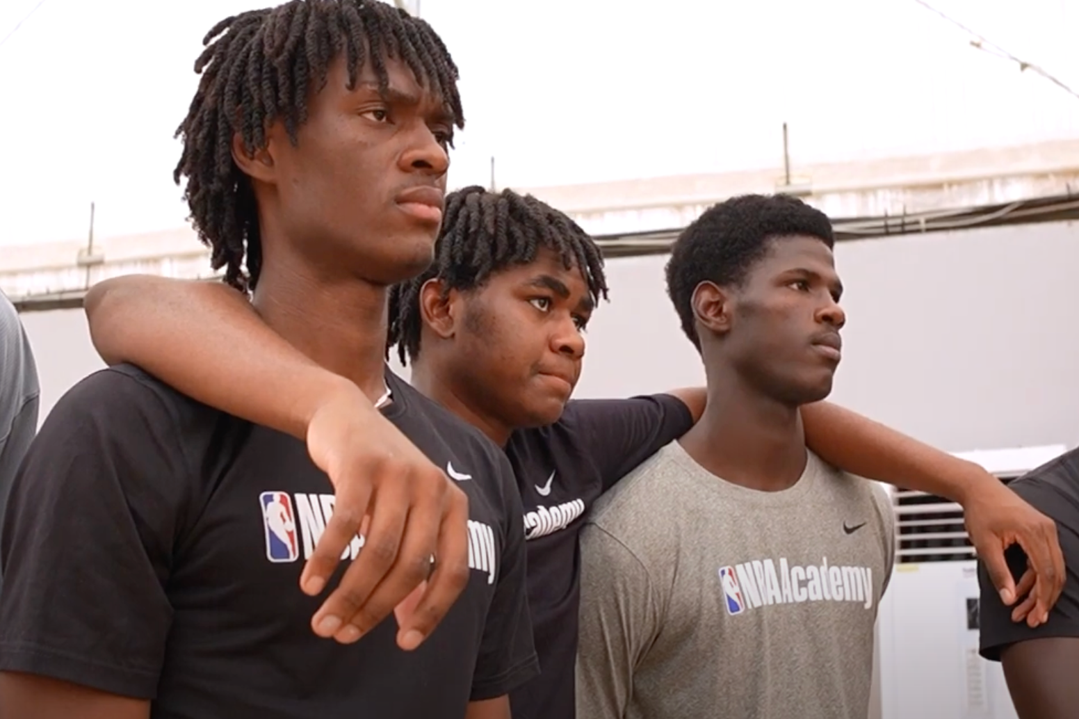 NBA Academy Africa players listen to their coach in June 2024. (Image from From Africa documentary film.)