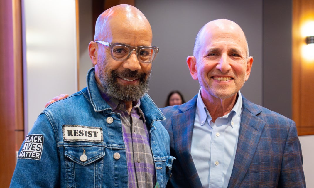 Kevin Blackistone, the 2024-25 recipient with Mark Hyman
