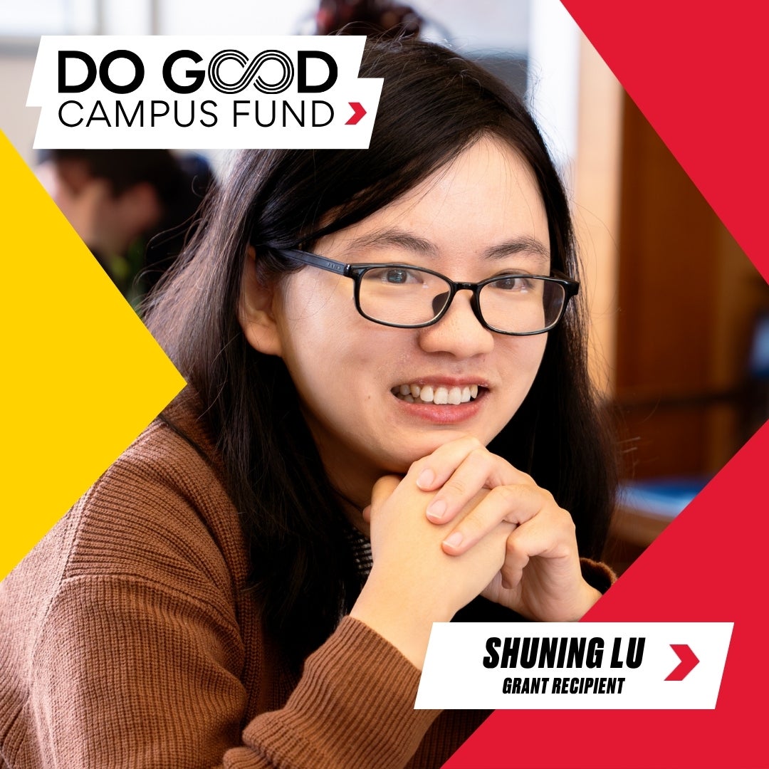 Graphic for the Do Good Campus Fund showing a person with long dark hair and glasses sitting with hands clasped; text reads “DO GOOD CAMPUS FUND” and “Shuning Lu — Grant Recipient,” with bold red and yellow diagonal shapes framing the image.